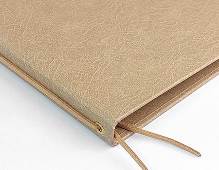 βιβλιοδεσία με κορ΄δόνι (εξωτερικά)